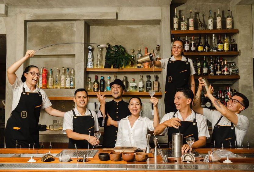 zapote bar team celebrating at the riviera maya with joshua monaghan